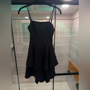Stylish Black Romper with Tie Back/Open Back.